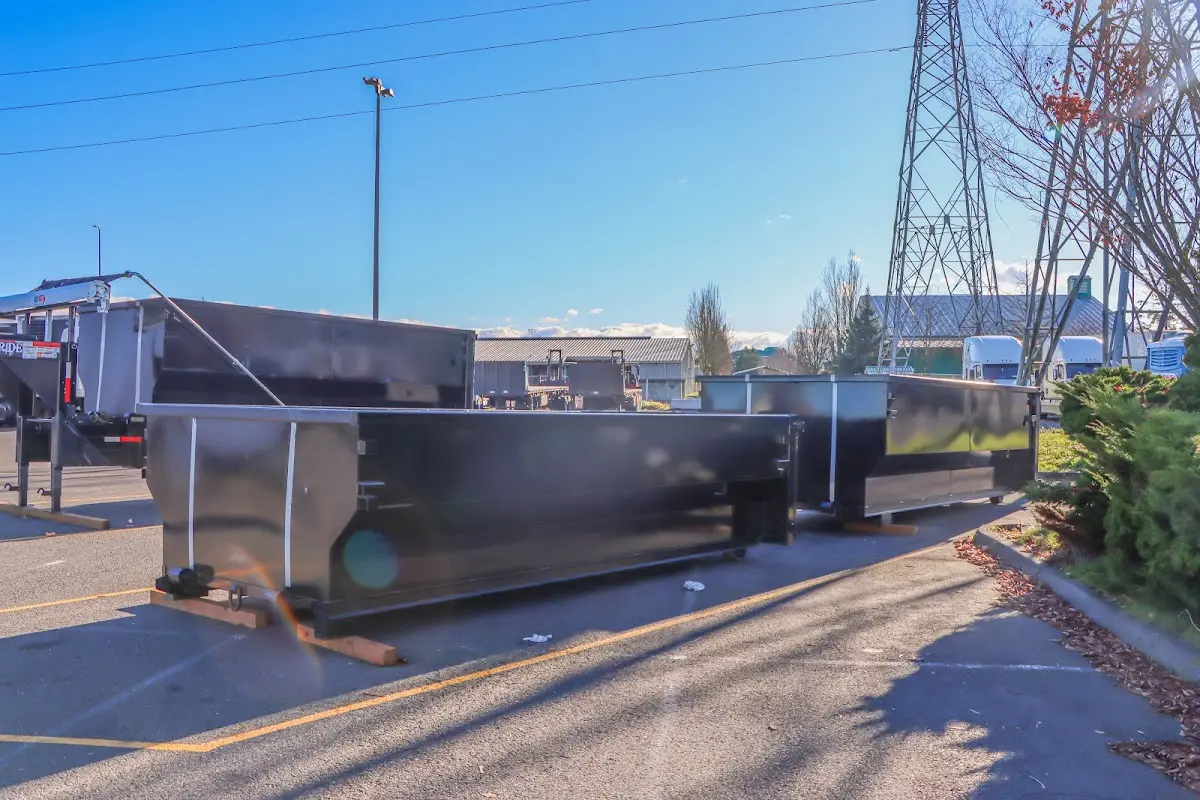 Roll-off dumpster ready for waste disposal at job site for 3 Yard Dumpster Rental in Point Pleasant